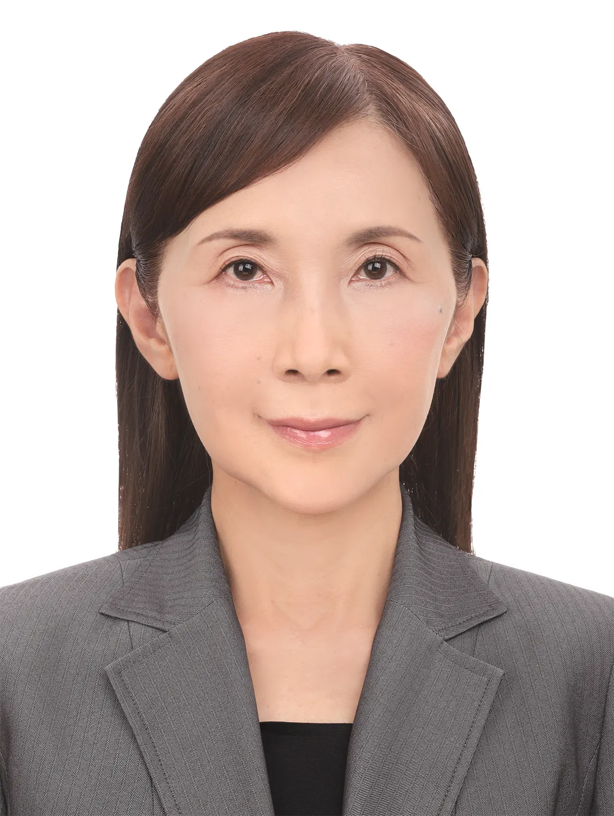 60代女性の社員証証明写真修正のアフター